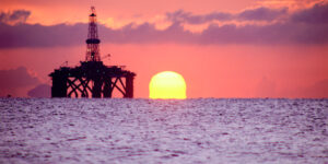 Oil rig at sunset